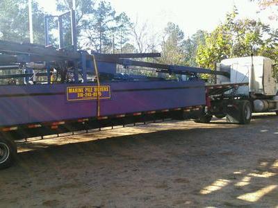 Barge folds for transport and to go under bridges