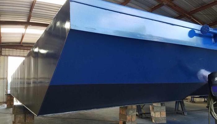 completed sectional barge
